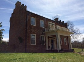 The Rhea - Hoss House was built in 1857 by Dr. Thomas Rhea. Late in 1865, Dr. Rhea moved his family to Kentucky and the home was sold to another physician, Dr. Henry Hoss.